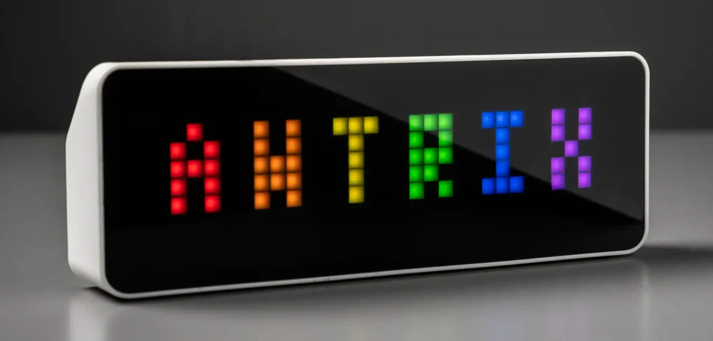 Stock image of a Ulanzi TC001 pixel clock displaying the AWTRIX boot image.